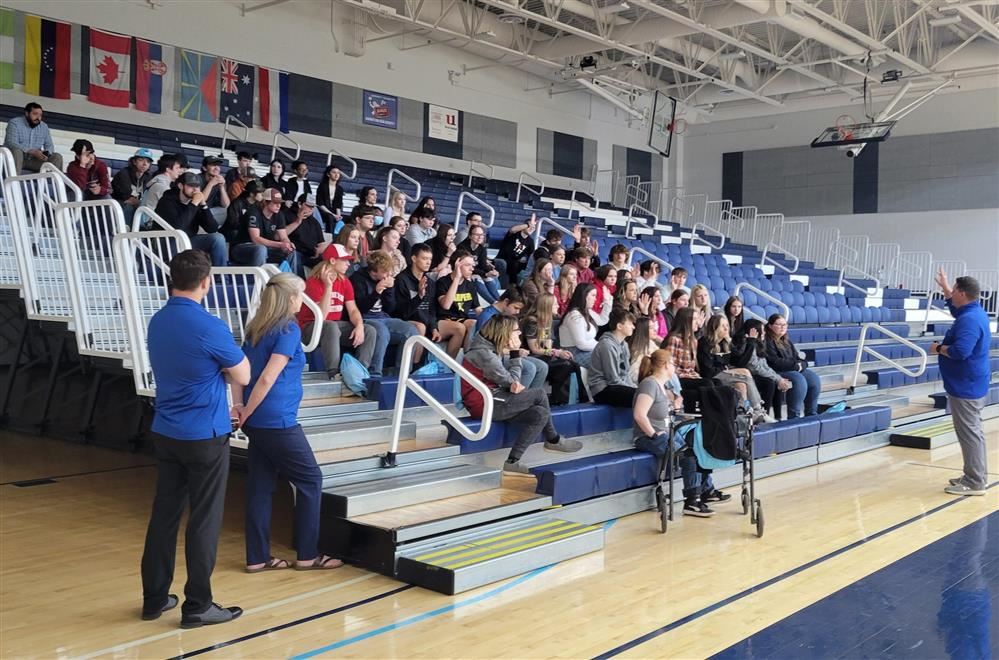  Students listen to a speaker at the CARC Gym as part of Garrett College preview day.